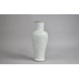 A 20th Century Chinese Celadon Glazed Vase with Incised Decoration Depicting Cranes in Scrolls and