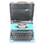 A Vintage Silver-Reed Silverette II Portable Manual Typewriter in Blue