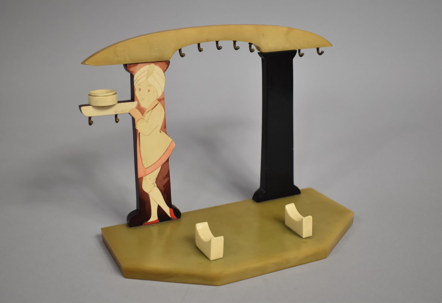An Mid 20th century Bakelite Stand for a Vanity Set, 120cms Wide and 17cms High