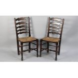 A Pair of Reproduction Rush Seated North Country Style Ladder Back Chairs