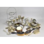 A Collection of Various Silver Plated Items to include Bud Vases, Bed Chamber Sticks, Tongs Etc