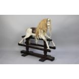 A Vintage Rocking Horse with Leather Bridle and Saddle, Glass Eyes Set on H Frame, 84cms Wide and