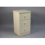 A Modern Cream Painted Three Drawer Bedside Chest, 38cm wide and 70cm high