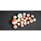 A Collection of Various Vintage Opaque Glass Marbles to Comprise Mainly Red Swirled Examples