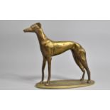 A Mid 20th century Heavy Brass Study of a Greyhound, Oval Base 24cms Long