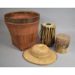 A Wicker Bin together with a Pith/Helmet together with Two various Drums