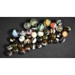 A Collection of Various Glass Marbles to Include Some Latticino Examples etc