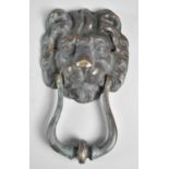 An Early 20th Century Green patinated Lion mask Door Knocker, 20cm High