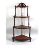 A Victorian Style Mahogany Four Tier Corner Whatnot with Galleried Top, Pierced Frieze and Turned