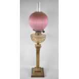 A Late Victorian/Edwardian Tall Oil Lamp in the Form of Reeded Corinthian Column on Stepped Plinth