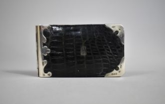 A Silver Mounted Leather Card and Stamp Holder, London 1889 Hallmark by T.E.T