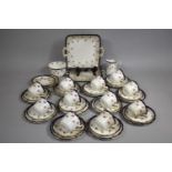 An Edwardian Grosvenor Rose Decorated China Tea Set to Comprise Eleven Cups, Twelve Saucers, Two