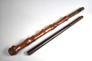 A Vintage Thornwood Irish Shillelagh with Cord Handle Together with a Turned Carved Wooden