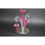 A Late Victorian Glass Three Trumpet Epergne on Circular Mirrored Stand Having Two Barley Sugar