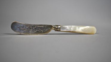 A Silver Bladed Butter Knife with Mother of Pearl Handle by George Unite, Birmingham 1847