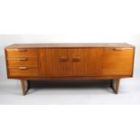 A 1970's Sideboard with Three Side Short Drawers, Central Shelved Cupboard and End Cocktail