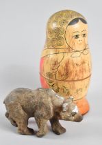 A Composition Bear with Glass Eyes, Condition Issues Together with a Mid 20th Century Russian Doll