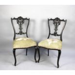 A Pair of Edwardian Salon Chairs with Carved and Pierced Back Splats and Cabriole Front Legs