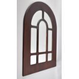 A Modern Wall Mirror in the Form of an Arched Window, 48cm wide
