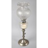An Edwardian Rise and Fall Oil Lamp with Glass Reservoir, Etched Shade and Chimney. 50cm high