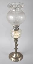 An Edwardian Rise and Fall Oil Lamp with Glass Reservoir, Etched Shade and Chimney. 50cm high