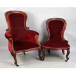 A Late Victorian Mahogany Framed Gents Buttoned Upholstered Armchair together with a Similar