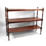 An Edwardian Mahogany Three Tier Rectangular Buffet with Turned Supports, 112cm wide