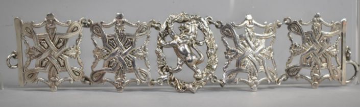 A Silver Sectional Bracelet of Ornate Scrolled and Pierced Forn Having Sectiobal Lions Rampant by