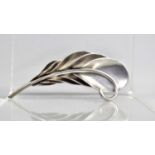 A Sterling Silver Brooch in the Form of a Feather, Stamped Sterling Made in England, 7cm Long