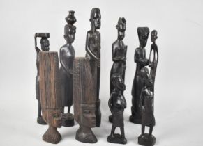 A Collection of Carved Wooden African Tribal Figures