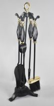 A Modern Brass and Wrought Iron Fire Companion Set