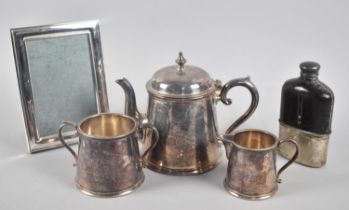 A Three Piece Silver Plated Tea Service, Silver Plated Photo Frame and a Hip Flask