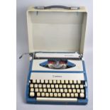 A Vintage Imperial Tab-O-Matic Manual Portable Typewriter