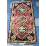 A Rectangular Patterned Hearth Rug, 180x94cm