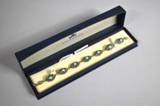 A Sterling Silver, Marcasite and Turquoise Cabochon Seven Section Bracelet