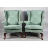 A Pair of Mid 20th Century Upholstered Wing Armchairs