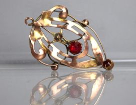 An Edwardian Art Nouveau 9ct Gold Pendant of Organic Form Having Central and Drop Facit Cut Red