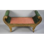 An Early 20th Century Giltwood Window Seat with Carved Scroll Ends over Shaped Legs. 51x113x59cms