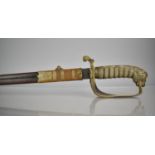 An 1847 Pattern Officers Naval Sword with Engraved Blade Featuring Crown Surmounting Anchor, Gilt