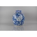 A Large 19th/20th Century Chinese Porcelain Blue and White Prunus Pattern Jar and Cover, 30cms High,