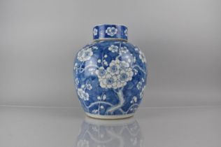 A Large 19th/20th Century Chinese Porcelain Blue and White Prunus Pattern Jar and Cover, 30cms High,