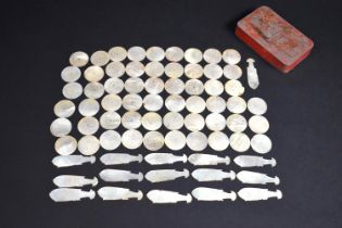 A Collection of Chinese Carved Mother of Pearl Gaming Tokens to Comprise 56 Disks and 16 Fish.