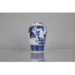 A 20th Century Oriental Blue and White Porcelain Jar and Cover of Baluster Form decorated in a