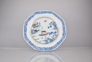 An 18th Century Porcelain Charger, Qianlong Period decorated with River Village Scene in Under