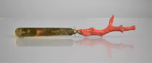 A 19th Century Coral Handled and Unmarked Gilt Metal Page Turner, The Handle of Claw Form