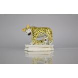 An Early 19th Century Staffordshire Pottery Figure Group of Leopard and Cub on Shaped Plinth Base,