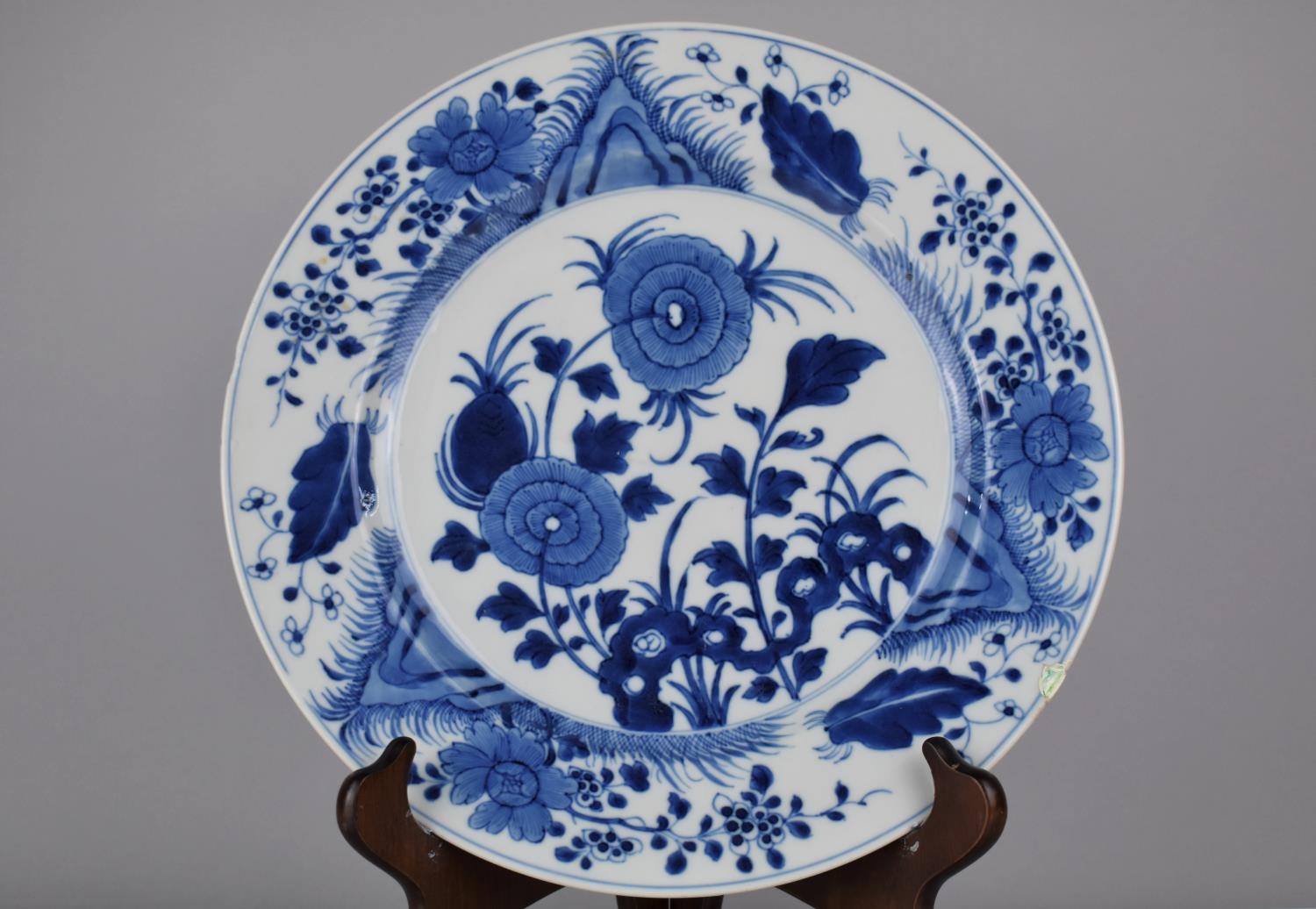A 19th Century Chinese Porcelain Blue and White Plate Decorated in a Floral Motif, the back with - Image 2 of 4