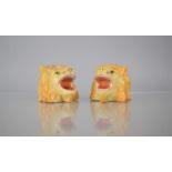 A Pair of Continental Porcelain Inkwells in the Form of Lion Heads, 6cms High