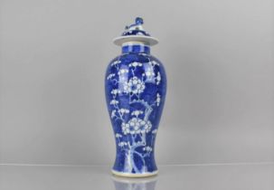 A 19th Century Chinese Porcelain Blue and White Prunus Pattern Baluster Vase and Cover, Double