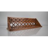 A Late 19th/Early 20th Century Carved and Pierced Book Trough, 50cms